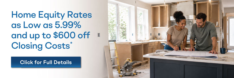 Couple reviewing kitchen renovation plans with FSB home equity rates as low as 5.99% and up to $600 off closing costs.